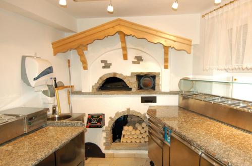 Kuchyň nebo kuchyňský kout v ubytování Residence Priska