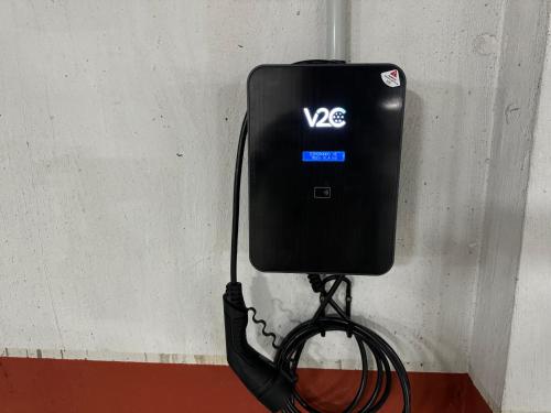 a black electric box is attached to a wall at High Rentxacobeo in Sarria