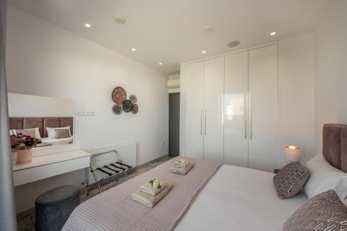 Una cama o camas en una habitación de Fig Tree Bay Residences 6