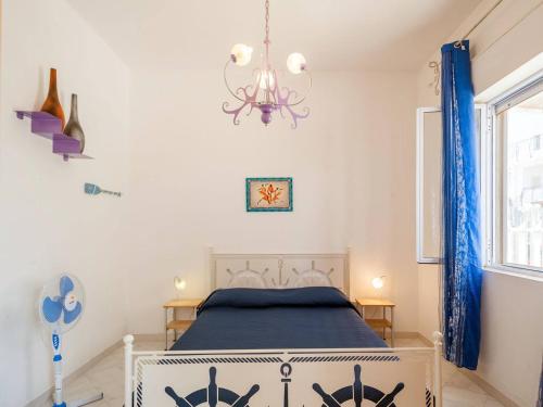 Ένα ή περισσότερα κρεβάτια σε δωμάτιο στο Sul mare Villa Telia