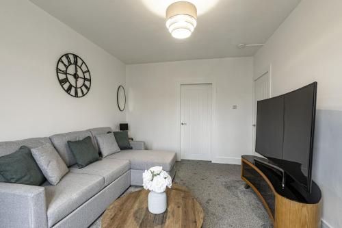 TV a/nebo společenská místnost v ubytování Bountrees Apartment