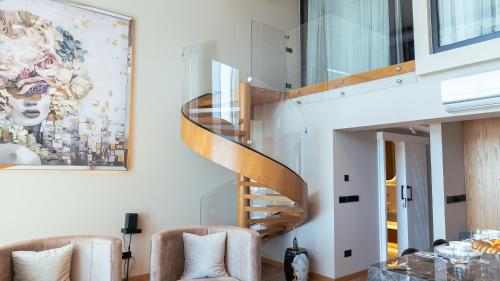 Fotografie z fotogalerie ubytování Mykonos Homes - Luxuriöses Penthouse mit Rooftop Pool, Meerblick, Gym v destinaci Kalogrea