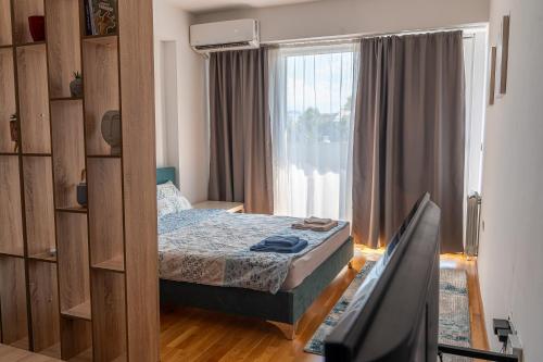 เตียงในห้องที่ Mia Apartment