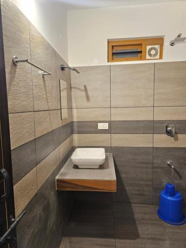 Koupelna v ubytování Rolax Tourist home