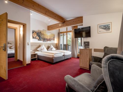 Postel nebo postele na pokoji v ubytování Quality Hosts Arlberg - Haus Pepi Eiter