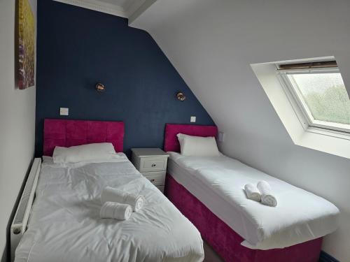 Postel nebo postele na pokoji v ubytování Dutch Tulip Rooms