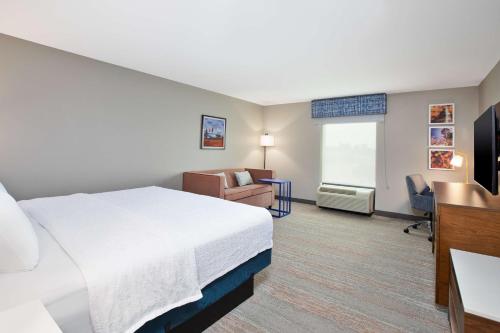 Ένα ή περισσότερα κρεβάτια σε δωμάτιο στο Hampton Inn Clinton