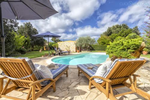 Fotografie z fotogalerie ubytování Alghero Villa Rujia with garden and pool v destinaci Porto Conte