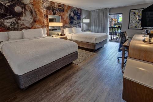 Ένα ή περισσότερα κρεβάτια σε δωμάτιο στο Courtyard by Marriott Nashville Vanderbilt West End