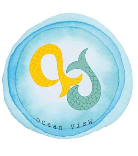 a plate with a seahorse on it at Ocean View Cedros in Santa Cruz das Flores