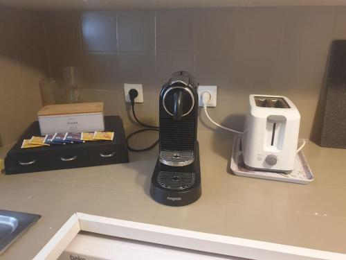 Kuchyň nebo kuchyňský kout v ubytování Appartement F3 à 5 min de Colmar