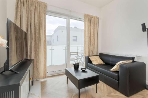 Χώρος καθιστικού στο Kartuska Stylish Apartment & Parking by Noclegi Renters