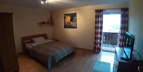 Postel nebo postele na pokoji v ubytování Bergblick