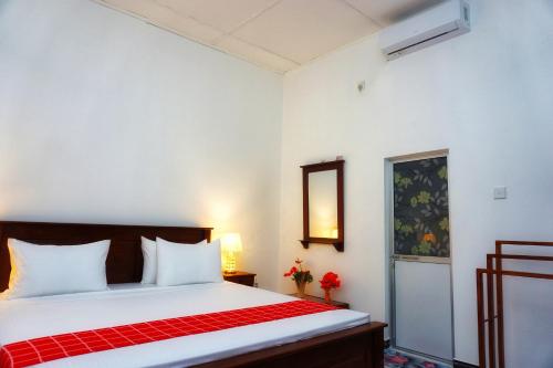 Postel nebo postele na pokoji v ubytování Lavender Resort