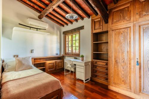 Postel nebo postele na pokoji v ubytování Casa Tramonto