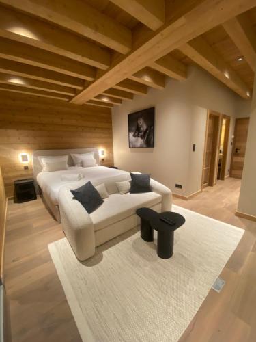 Ένα ή περισσότερα κρεβάτια σε δωμάτιο στο Chalet - L'Ours Blanc