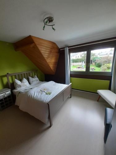 Postel nebo postele na pokoji v ubytování Au bord de l'Orléans