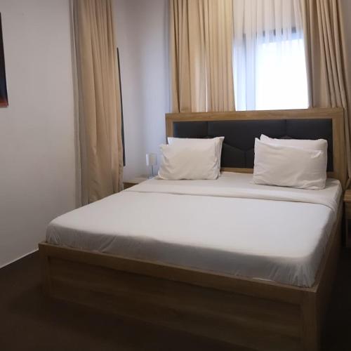 Cama o camas de una habitación en Enzo Apartments