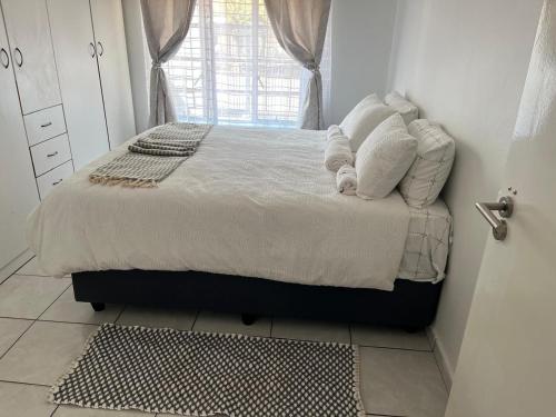 Postel nebo postele na pokoji v ubytování Eagle Apartment