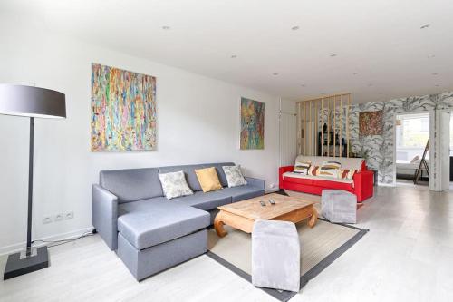 Posezení v ubytování Beaugrenelle Tour Eiffel II Cosy Apartment 2BR