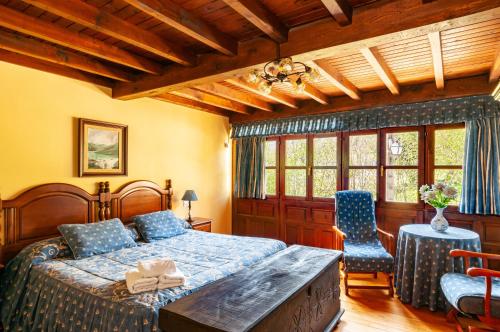 Postel nebo postele na pokoji v ubytování Casa Rural La Regoria