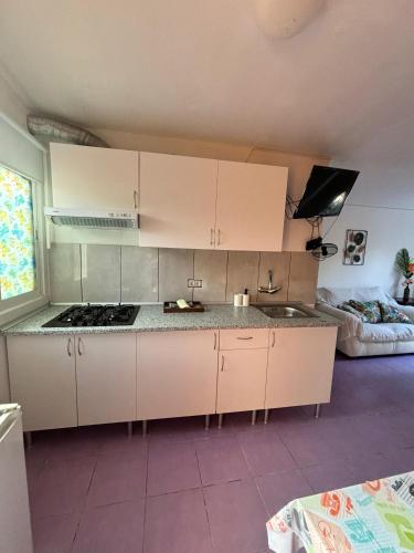 Kuchyň nebo kuchyňský kout v ubytování Camping Invernaderito