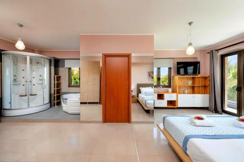Mirsini Villa Private Pool & Jacuzziにあるベッド
