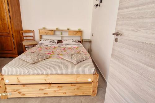 Ένα ή περισσότερα κρεβάτια σε δωμάτιο στο Studio dans un petit village entre Annecy - Genève