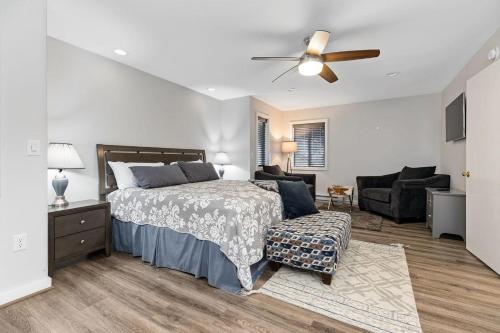 a bedroom with a bed and a living room at Bull City Bungalow with Wintergreen Advantage in Wintergreen