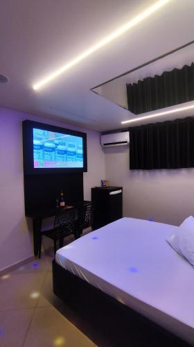 Katil atau katil-katil dalam bilik di Vem para o - Motel Marselha