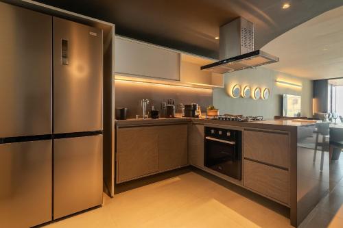 Кухня или мини-кухня в Gorges Residence Salvador
