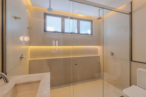 Ванная комната в Gorges Residence Salvador