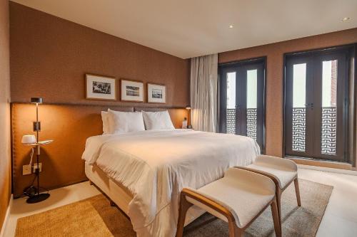 Кровать или кровати в номере Gorges Residence Salvador