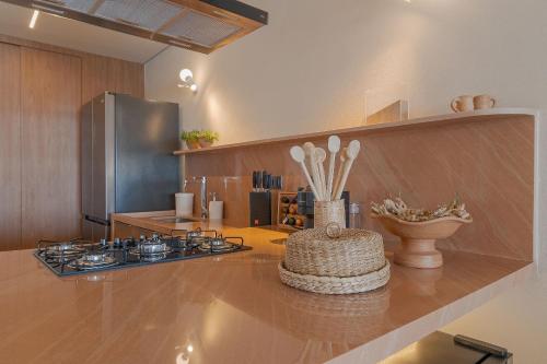 Кухня или мини-кухня в Gorges Residence Salvador
