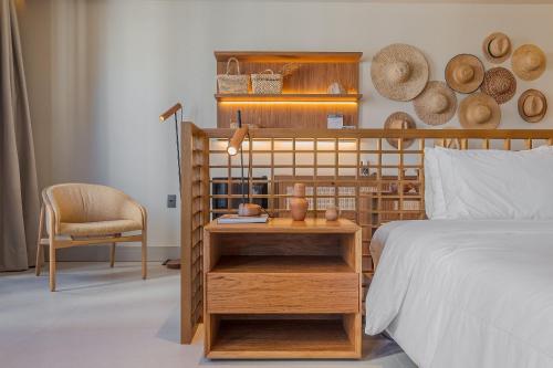 Кровать или кровати в номере Gorges Residence Salvador