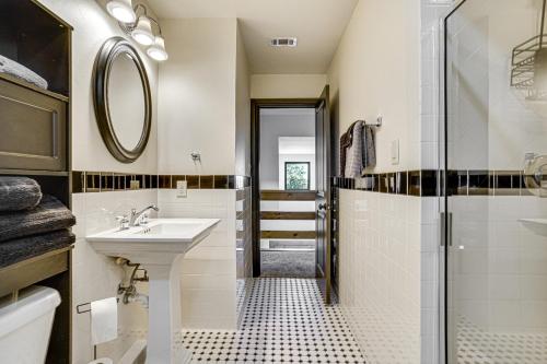 a bathroom with a sink and a shower at Hot Tub and Fire Pit Possum Kingdom Lake Retreat! in Strawn