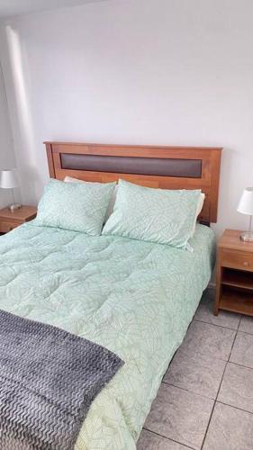 Una cama o camas en una habitación de Portada VIP