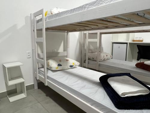 Postel nebo postele na pokoji v ubytování Pousada Suíte Suzena