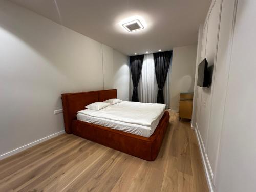Postel nebo postele na pokoji v ubytování Sea Breeze The Grand Woo Apartments