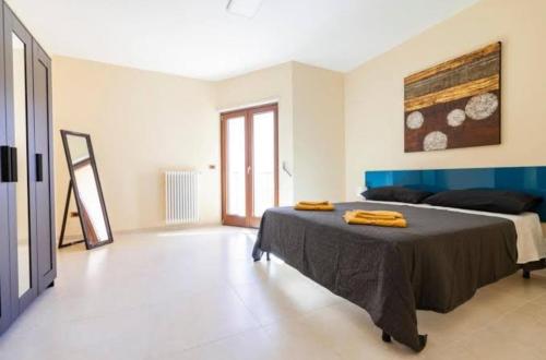 Postel nebo postele na pokoji v ubytování Calefati Holiday 412