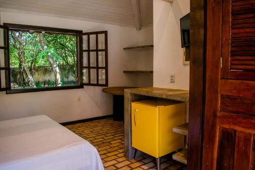 Ένα ή περισσότερα κρεβάτια σε δωμάτιο στο Mansão do Sol