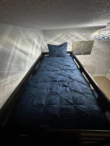 a large bed in a room with at Beautiful and comfy home! in Seffner