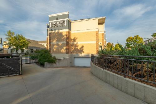 a building with a sign on the side of it at Staybridge Suites Middleton/Madison-West by IHG in Middleton