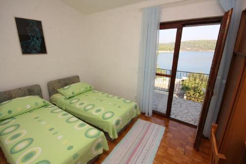 Postel nebo postele na pokoji v ubytování Apartment Jagoda