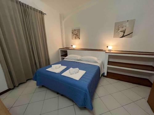 Ένα ή περισσότερα κρεβάτια σε δωμάτιο στο Andromeda Holiday 1 C