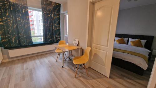 Een bed of bedden in een kamer bij Sophia Home 2