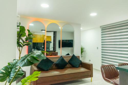 TV a/nebo společenská místnost v ubytování Piso en el Quindío, apartamento de lujo