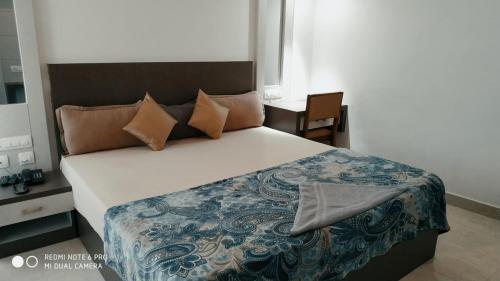 Postel nebo postele na pokoji v ubytování Central Abode Family Rooms