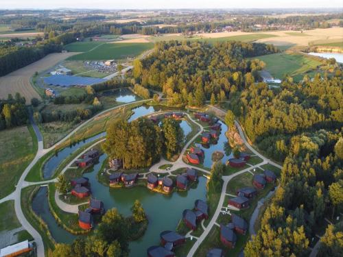 an aerial view of a park with a lake at Peaceful Bungalow Escape in Antoing