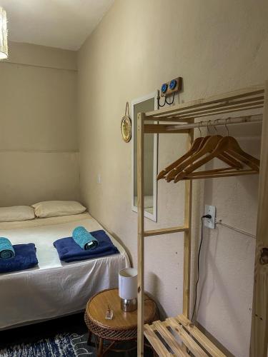 Ένα ή περισσότερα κρεβάτια σε δωμάτιο στο Casa Surya Paraty